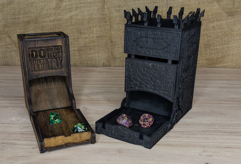 Wooden dice towers with engraved details and open rolling chambers, handcrafted tabletop RPG accessories